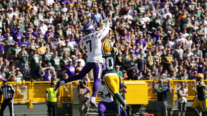  Minnesota Vikings cornerback Byron Murphy Jr. (7) breaks up the  pass intended for Green Bay Packers wide receiver Bo Melton.