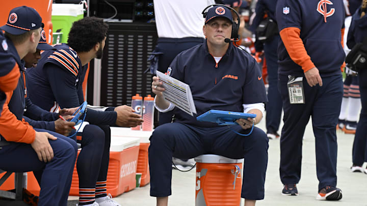 Bears offensive coordinator Shane Waldron goes over things with Caleb Williams and the quarterbacks during Sunday's 24-18 Bears win.