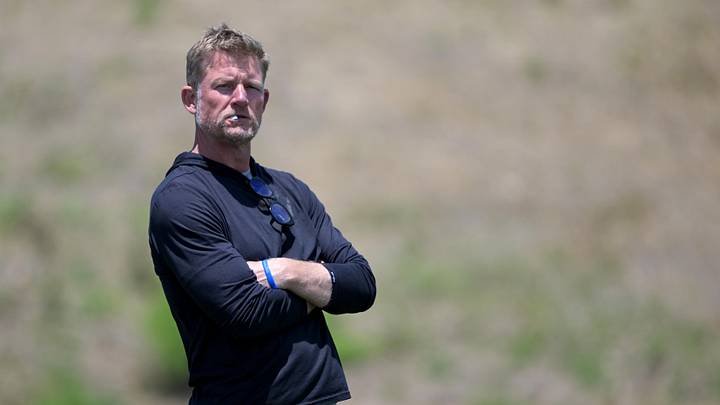 May 28, 2024; Thousand Oaks, CA, USA; Les  Snead, General Manager of the Los Angeles Rams, looks on during OTAs at the team training facility at California Lutheran University. Mandatory Credit: Jayne Kamin-Oncea-Imagn Images