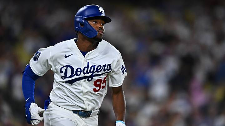 Sep 22, 2026; Los Angeles, California, USA; Los Angeles Dodgers designated hitter Josue De Paula (95) triples during the sixth inning against the San Diego Padres at Dodger Stadium. Mandatory Credit: William Liang-Imagn Images Sep 22, 2026; Los Angeles, California, USA; Los Angeles Dodgers designated hitter Josue De Paula (95) triples during the sixth inning against the San Diego Padres at Dodger Stadium. Mandatory Credit: William Liang-Imagn Images