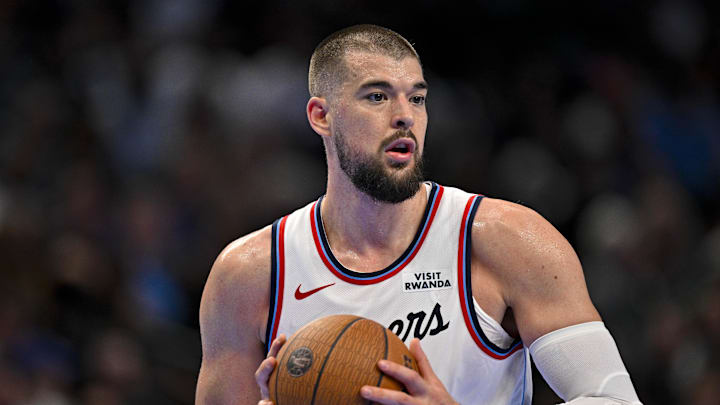 Nov 14, 2025; Dallas, Texas, USA; LA Clippers center Ivica Zubac (40) looks to pass the ball during the second quarter against the Dallas Mavericks in an NBA Cup game at the American Airlines Center. Mandatory Credit: Jerome Miron-Imagn Images