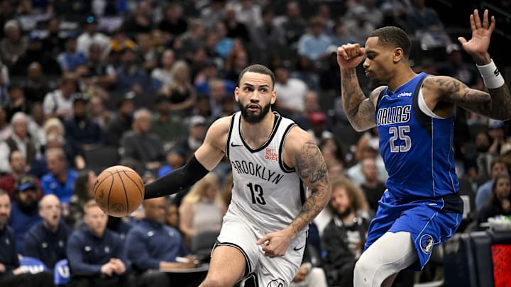 Mar 31, 2025; Dallas, Texas, USA; Brooklyn Nets guard Tyrese Martin (13) and Dallas Mavericks forward P.J. Washington (25) in action during the game between the Dallas Mavericks and the Brooklyn Nets at the American Airlines Center. Mandatory Credit: Jerome Miron-Imagn Images