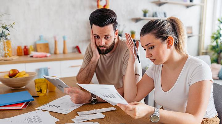 Couple working on finances Couple working on finances