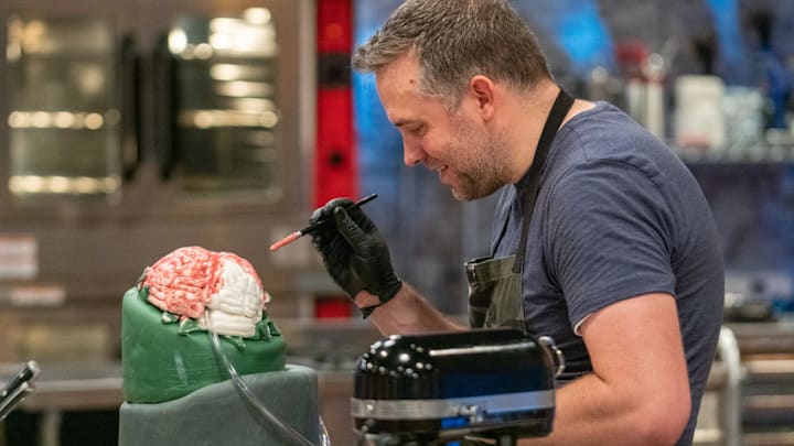 Peter Tidwell paints his brain as seen on Halloween Baking Championship Season 5 Episode 6. photo provided by Food Network