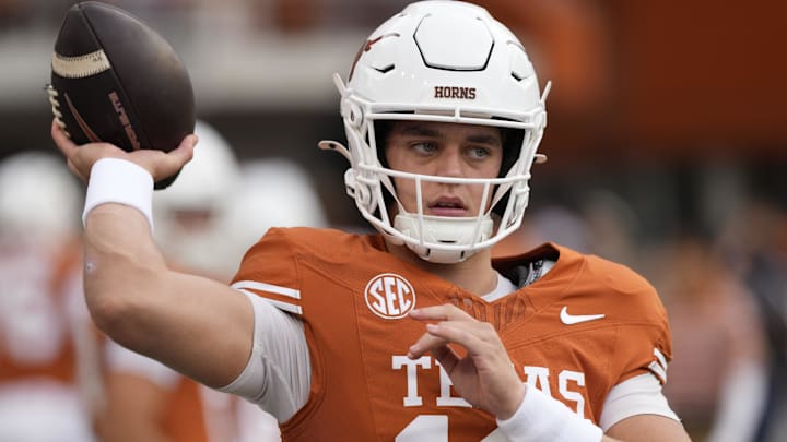 Texas Longhorns quarterback Arch Manning warms up before a game against the Vanderbilt Commodores at Darrell K Royal-Texas Memorial Stadium. Texas Longhorns quarterback Arch Manning warms up before a game against the Vanderbilt Commodores at Darrell K Royal-Texas Memorial Stadium.