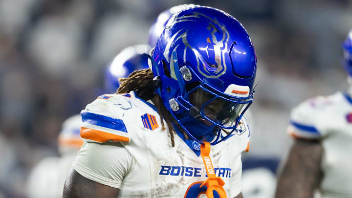 Dec 31, 2024; Glendale, AZ, USA; Boise State Broncos running back Ashton Jeanty (2) reacts against the Penn State Nittany Lions during the Fiesta Bowl at State Farm Stadium. Mandatory Credit: Mark J. Rebilas-Imagn Images