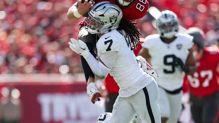 Dec 8, 2024; Tampa, Florida, USA; Tampa Bay Buccaneers tight end Cade Otton (88) is stopped by Las Vegas Raiders safety Tre'von Moehrig (7) in the first quarter at Raymond James Stadium. Mandatory Credit: Nathan Ray Seebeck-Imagn Images Dec 8, 2024; Tampa, Florida, USA; Tampa Bay Buccaneers tight end Cade Otton (88) is stopped by Las Vegas Raiders safety Tre'von Moehrig (7) in the first quarter at Raymond James Stadium. Mandatory Credit: Nathan Ray Seebeck-Imagn Images