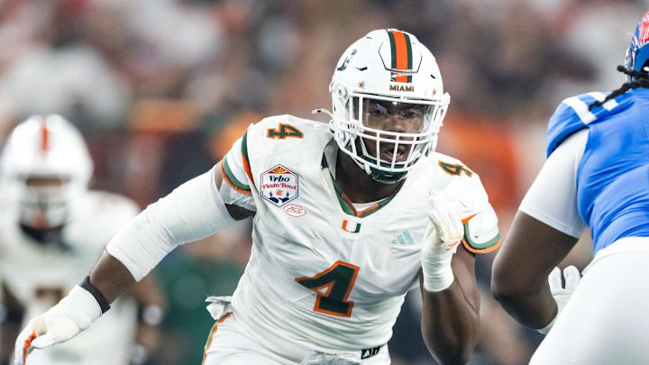 Jan 8, 2026; Glendale, AZ, USA; Miami Hurricanes defensive lineman Rueben Bain Jr. (4) against the Mississippi Rebels during the 2026 Fiesta Bowl and semifinal game of the College Football Playoff at State Farm Stadium. Mandatory Credit: Mark J. Rebilas-Imagn Images