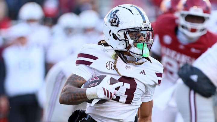 Mississippi State Bulldogs wide receiver Anthony Evans III (3) runs after a catch during the third quarter against the Arkansas Razorbacks at Donald W. Reynolds Razorback Stadium. Bulldogs won 38-35.