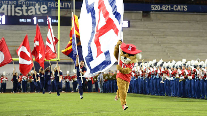 Nov. 23, 2012; Tucson, AZ, USA: Arizona Wildcats mascot Wilbur runs onto the field prior to the game against the Arizona State Sun Devils at Arizona Stadium. The Sun Devils defeated the Wildcats 41-34. Mandatory Credit: Mark J. Rebilas-Imagn Images