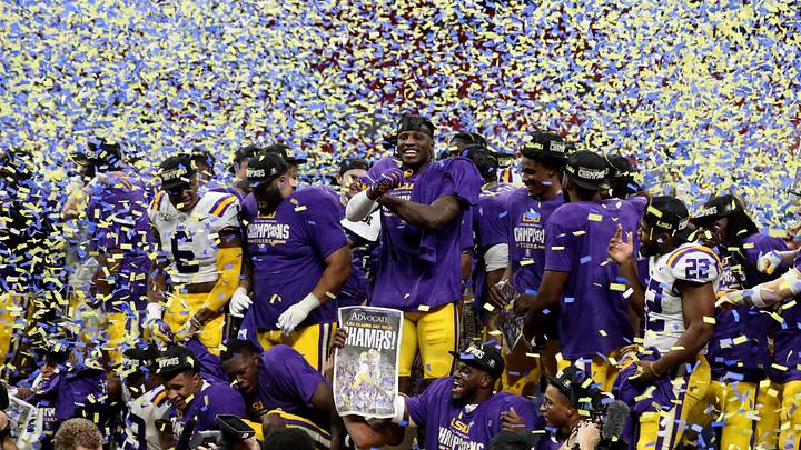 Dec 7, 2019; Atlanta, GA, USA; Confetti is dropped from the ceiling as the LSU Tigers celebrate their win against the Georgia Bulldogs in the 2019 SEC Championship Game at Mercedes-Benz Stadium. Mandatory Credit: Jason Getz-USA TODAY Sports Dec 7, 2019; Atlanta, GA, USA; Confetti is dropped from the ceiling as the LSU Tigers celebrate their win against the Georgia Bulldogs in the 2019 SEC Championship Game at Mercedes-Benz Stadium. Mandatory Credit: Jason Getz-USA TODAY Sports