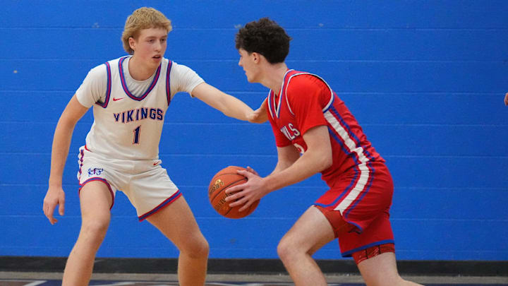 Wisconsin Lutheran's Kager Knueppel (1) guards Slinger's Jack Kohnen (3) during the game at Wisconsin Lutheran High School, in Milwaukee, Wisconsin, Dec. 9, 2025. Wisconsin Lutheran won the game, 68-46. Wisconsin Lutheran's Kager Knueppel (1) guards Slinger's Jack Kohnen (3) during the game at Wisconsin Lutheran High School, in Milwaukee, Wisconsin, Dec. 9, 2025. Wisconsin Lutheran won the game, 68-46.