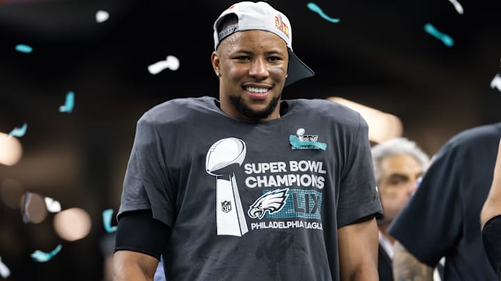 Philadelphia Eagles running back Saquon Barkley (26) celebrates after defeating the Kansas City Chiefs during Super Bowl LIX at Ceasars Superdome.