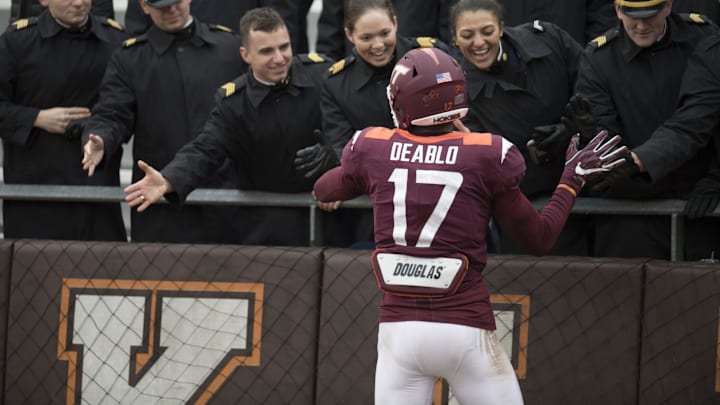 Dec 1, 2018; Blacksburg, VA, USA; Virginia Tech Hokies Divine Deablo (17) celebrates the win against the Marshall Thundering Herd with the keydets at Lane Stadium. Mandatory Credit: Lee Luther Jr.-Imagn Images Dec 1, 2018; Blacksburg, VA, USA; Virginia Tech Hokies Divine Deablo (17) celebrates the win against the Marshall Thundering Herd with the keydets at Lane Stadium. Mandatory Credit: Lee Luther Jr.-Imagn Images