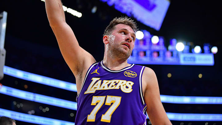 Nov 5, 2025; Los Angeles, California, USA; Los Angeles Lakers guard Luka Doncic (77) reacts after scoring the basket and drawing the foul against the San Antonio Spurs during the first half at Crypto.com Arena. Mandatory Credit: Gary A. Vasquez-Imagn Images