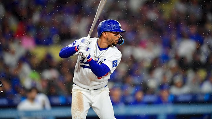 Mar 31, 2026; Los Angeles, California, USA; Los Angeles Dodgers shortstop Mookie Betts (50) at bat against the Cleveland Guardians during the fifth inning at Dodger Stadium. Mandatory Credit: Gary A. Vasquez-Imagn Images Mar 31, 2026; Los Angeles, California, USA; Los Angeles Dodgers shortstop Mookie Betts (50) at bat against the Cleveland Guardians during the fifth inning at Dodger Stadium. Mandatory Credit: Gary A. Vasquez-Imagn Images