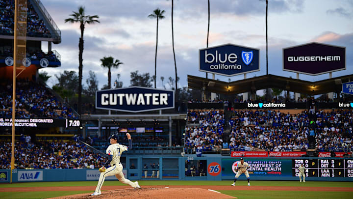 Los Angeles Dodgers pitcher Roki Sasaki (11) throws against the Pittsburgh Pirates during the fifth inning at Dodger Stadium. 