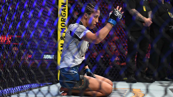 Aug 5, 2023; Nashville, Tennessee, USA;  Tatiana Suarez (blue gloves) celebrates the win by