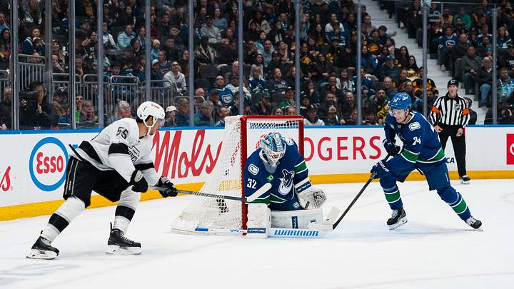 Apr 14, 2026; Vancouver, British Columbia, CAN; Vancouver Canucks defenseman Zeev Buium (24) watches goalie Kevin Lankinen (32) makes a save on Los Angeles Kings forward Quinton Byfield (55) in the third period at Rogers Arena. Mandatory Credit: Bob Frid-Imagn Images Apr 14, 2026; Vancouver, British Columbia, CAN; Vancouver Canucks defenseman Zeev Buium (24) watches goalie Kevin Lankinen (32) makes a save on Los Angeles Kings forward Quinton Byfield (55) in the third period at Rogers Arena. Mandatory Credit: Bob Frid-Imagn Images