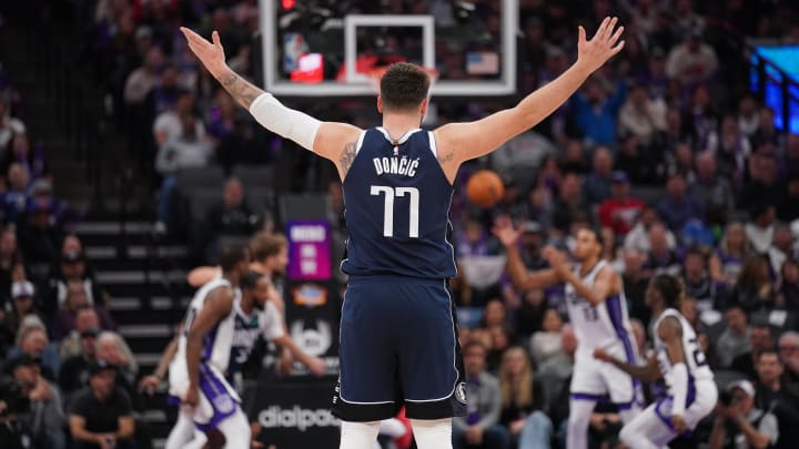 Mar 29, 2024; Sacramento, California, USA; Dallas Mavericks guard Luka Doncic (77) raises his arms Mar 29, 2024; Sacramento, California, USA; Dallas Mavericks guard Luka Doncic (77) raises his arms