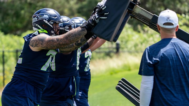 Seattle Seahawks offensive linemen including Abraham Lucas (72) take part in drills during mini-camp. Seattle Seahawks offensive linemen including Abraham Lucas (72) take part in drills during mini-camp.