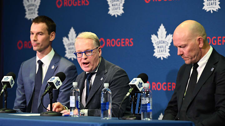 May 4, 2026; Toronto, Ontario, CANADA;  Maple Leafs Sports and Entertainment CEO Keith Pelley answers media questions between Toronto Maple Leafs general manager John Chayka (left) and senior executive advisor Mats Sundin during an introductory news conference at Real Sports Bar and Grill. Mandatory Credit: Dan Hamilton-Imagn Images