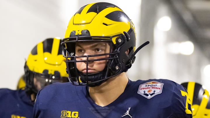 Dec 31, 2022; Glendale, Arizona, USA; Michigan Wolverines offensive lineman Jeffrey Persi (79) against the TCU Horned Frogs during the 2022 Fiesta Bowl at State Farm Stadium. Mandatory Credit: Mark J. Rebilas-Imagn Images