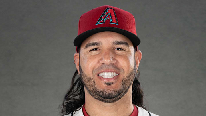 Feb 19, 2025; Scottsdale, AZ, USA; Arizona Diamondbacks infielder Eugenio Suarez (28) poses for a portrait for MLB Media Day at Salt River Fields.  Mandatory Credit: Allan Henry-Imagn Images