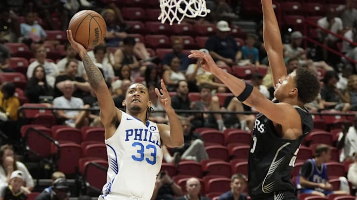 Jul 10, 2025; Las Vegas, NV, USA; Philadelphia 76ers guard Judah Mintz (33) shoots against San Antonio Spurs forward Carter Bryant (11) in the third quarter of their game at Thomas & Mack Center. Mandatory Credit: Candice Ward-Imagn Images