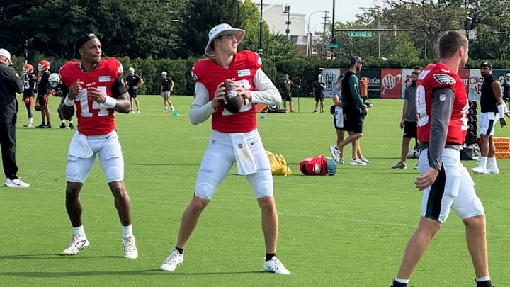 Eagles backup quarterbacks, from left to right, Dorian Thompson-Robinson, Tanner McKee, and Kyle McCord get ready to practice during training camp. Eagles backup quarterbacks, from left to right, Dorian Thompson-Robinson, Tanner McKee, and Kyle McCord get ready to practice during training camp.