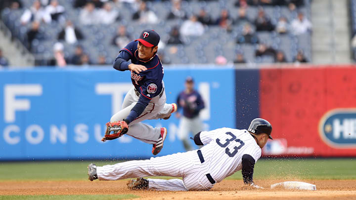 Nick Swisher, Tsuyoshi Nishioka Nick Swisher, Tsuyoshi Nishioka