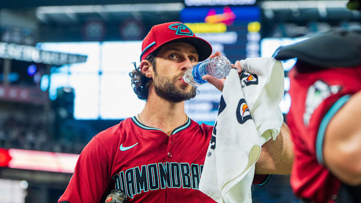 Apr 14, 2024; Phoenix, Arizona, USA; Arizona Diamondbacks starting pitcher Zac Gallen (23) readies himself to pitch before the start of a game against the St. Louis Cardinals at Chase Field. Mandatory Credit: Allan Henry-USA TODAY Sports