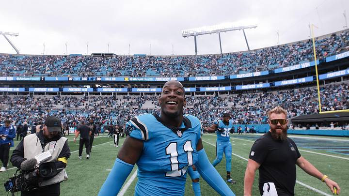 Oct 12, 2025; Charlotte, North Carolina, USA; Carolina Panthers linebacker Nic Scourton (11) looks on after the game against the Dallas Cowboys at Bank of America Stadium. Mandatory Credit: Scott Kinser-Imagn Images