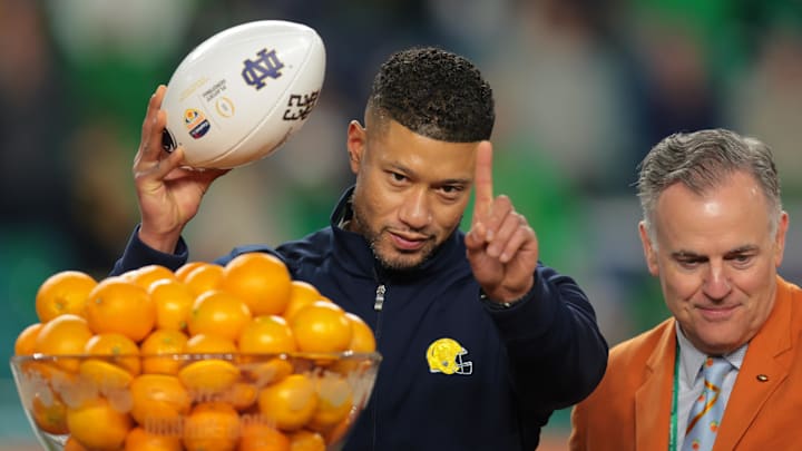(EDITORS NOTE: caption correction) Jan 9, 2025; Miami, FL, USA; Notre Dame Fighting Irish head coach Marcus Freeman celebrates defeating the Penn State Nittany Lions  in the Orange Bowl at Hard Rock Stadium.