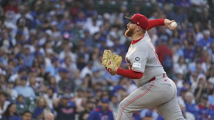 Aug 5, 2025; Chicago, Illinois, USA; Cincinnati Reds pitcher Zack Littell (52) throws the ball against the Chicago Cubs during the first inning at Wrigley Field. Mandatory Credit: David Banks-Imagn Images