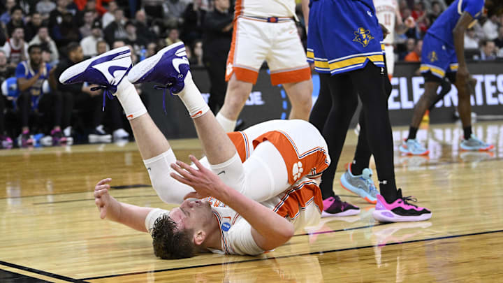 Clemson Tigers center Viktor Lakhin falls to the floor against the McNeese State Cowboys during the first half at Amica Mutual Pavilion. Clemson Tigers center Viktor Lakhin falls to the floor against the McNeese State Cowboys during the first half at Amica Mutual Pavilion.