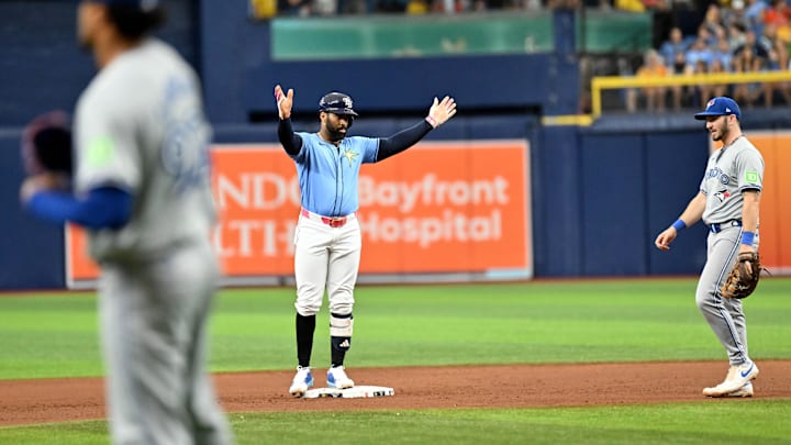 Sep 22, 2024; St. Petersburg, Florida, USA; Tampa Bay Rays pinch hitter Yandy Diaz (2) reacts after hitting a double in the seventh inning against the Toronto Blue Jays at Tropicana Field.