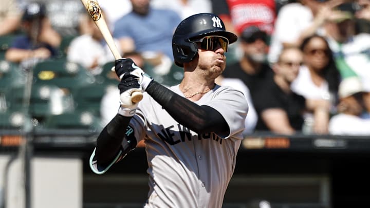 Aug 31, 2025; Chicago, Illinois, USA; New York Yankees outfielder Cody Bellinger (35) hits an RBI-double against the Chicago White Sox during the third inning at Rate Field. Mandatory Credit: Kamil Krzaczynski-Imagn Images
