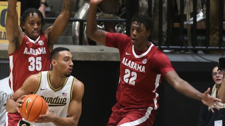 Alabama Crimson Tide forward Derrion Reid (35) and Alabama Crimson Tide forward Aiden Sherrell (22) defend Purdue Boilermakers forward Trey Kaufman-Renn (4) Friday, Nov. 15, 2024, during the NCAA men’s basketball game at Mackey Arena in West Lafayette, Ind. Alabama Crimson Tide forward Derrion Reid (35) and Alabama Crimson Tide forward Aiden Sherrell (22) defend Purdue Boilermakers forward Trey Kaufman-Renn (4) Friday, Nov. 15, 2024, during the NCAA men’s basketball game at Mackey Arena in West Lafayette, Ind.