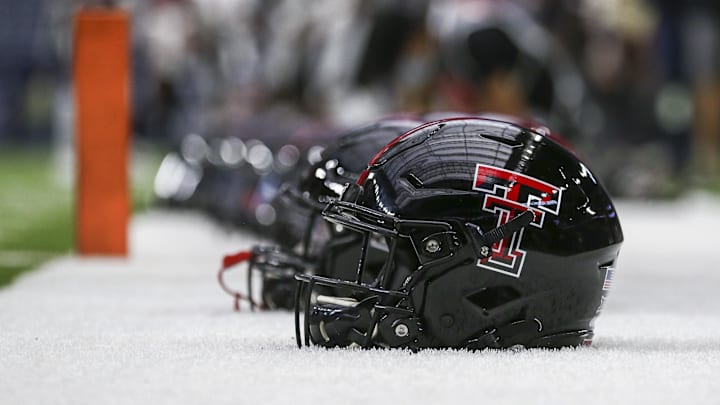Sep 4, 2021; Houston, Texas, USA; Texas Tech Red Raiders players helmets are lined up on the sideline during practice before the game against the Houston Cougars at NRG Stadium. Mandatory Credit: Troy Taormina-Imagn Images
