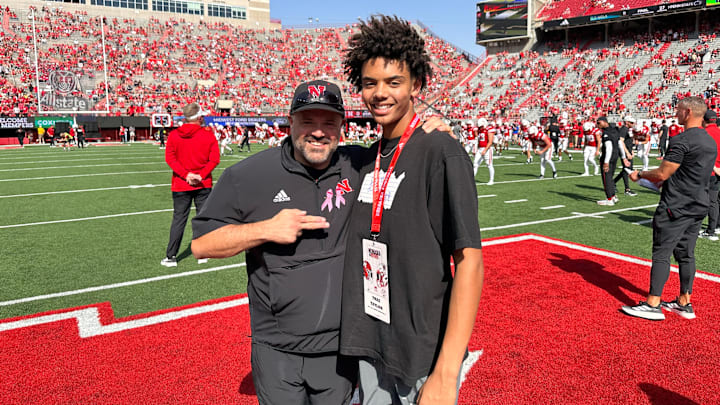 2027 four-star quarterback Trae Taylor (right) with Nebraska football coach Matt Rhule (left) after the Rutgers game.