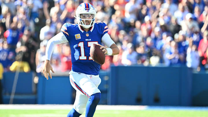 Buffalo Bills quarterback Josh Allen runs for a gain during the fourth quarter against the New Orleans Saints.