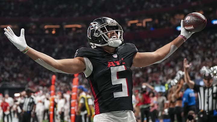 Sep 22, 2024; Atlanta, Georgia, USA; Atlanta Falcons wide receiver Drake London (5) reacts after catching a touchdown pass against the Kansas City Chiefs during the first quarter at Mercedes-Benz Stadium. Mandatory Credit: Dale Zanine-Imagn Images