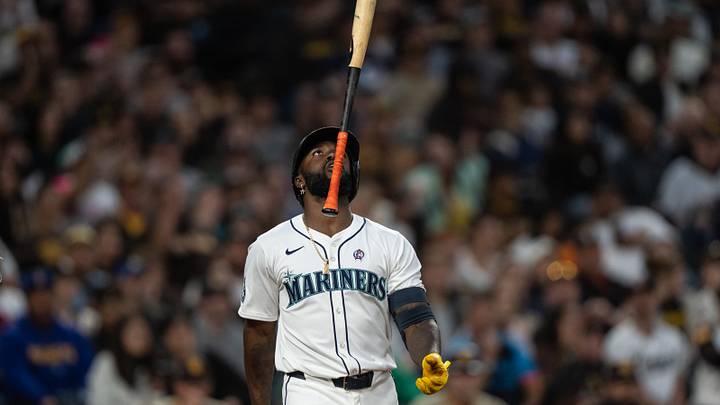 Sep 11, 2024; Seattle, Washington, USA;  Seattle Marinersleft fielder Randy Arozarena (56) tosses his bat after a colled third strike during the third inning against the San Diego Padres at T-Mobile Park. Mandatory Credit: Stephen Brashear-Imagn Images