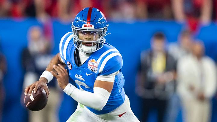 Jan 8, 2026; Glendale, AZ, USA; Mississippi Rebels quarterback Trinidad Chambliss (6) against the Miami Hurricanes during the 2026 Fiesta Bowl and semifinal game of the College Football Playoff at State Farm Stadium. Mandatory Credit: Mark J. Rebilas-Imagn Images Jan 8, 2026; Glendale, AZ, USA; Mississippi Rebels quarterback Trinidad Chambliss (6) against the Miami Hurricanes during the 2026 Fiesta Bowl and semifinal game of the College Football Playoff at State Farm Stadium. Mandatory Credit: Mark J. Rebilas-Imagn Images