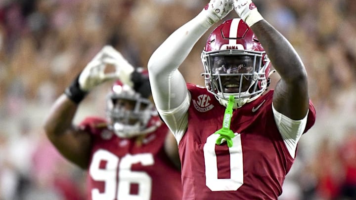 Sep 28, 2024; Tuscaloosa, Alabama, USA;  Alabama Crimson Tide linebacker Deontae Lawson (0) and defensive lineman Tim Keenan III (96) signal for a safety against the Georgia Bulldogs at Bryant-Denny Stadium. Mandatory Credit: Gary Cosby Jr.-Imagn Images