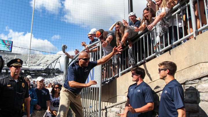 Penn State football coach James Franklin celebrates with the students following a victory at Beaver Stadium. Penn State football coach James Franklin celebrates with the students following a victory at Beaver Stadium.