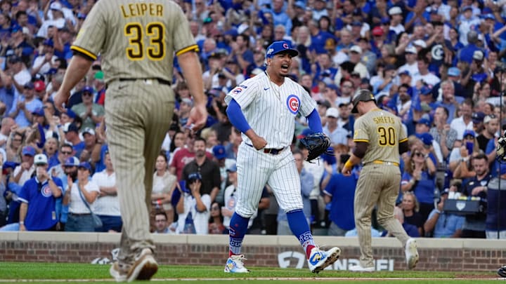 Oct 2, 2025; Chicago, Illinois, USA; Chicago Cubs relief pitcher Daniel Palencia (48) reacts after striking out San Diego Padres right fielder Fernando Tatis Jr. (23) to end the fifth inning during game three of the Wildcard round for the 2025 MLB playoffs at Wrigley Field. Mandatory Credit: David Banks-Imagn Images