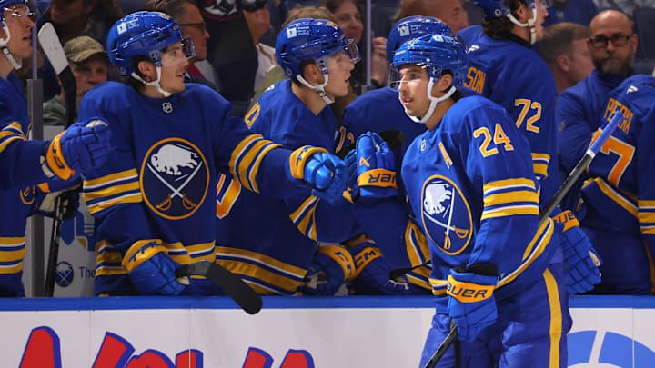 Sep 21, 2024; Buffalo, New York, USA;  Buffalo Sabres center Dylan Cozens (24) celebrates his goal with teammates during the third period against the Pittsburgh Penguins at KeyBank Center. Mandatory Credit: Timothy T. Ludwig-Imagn Images