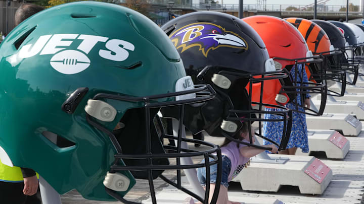 Oct 7, 2023; London, United Kingdom; Large oversized helmets of the New York Jets Baltimore Ravens, Cleveland Browns and Cincinnati Bengals at the NFL Experience London at the Battersea Power Station. Mandatory Credit: Kirby Lee-Imagn Images Oct 7, 2023; London, United Kingdom; Large oversized helmets of the New York Jets Baltimore Ravens, Cleveland Browns and Cincinnati Bengals at the NFL Experience London at the Battersea Power Station. Mandatory Credit: Kirby Lee-Imagn Images